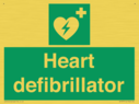 green-background-with-white-text-and-heart-defibrillator-symbol--white-cross-and~